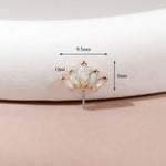 A small gold-toned stud earring with five iridescent opal stones arranged in a fan shape, shown on a soft beige surface with overlaid dimension arrows and labels reading 9.5mm and 5mm.